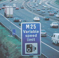 M25 road sign and traffic