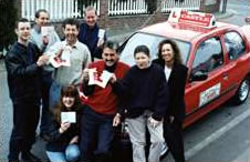 Colin with seven pupils from the same family